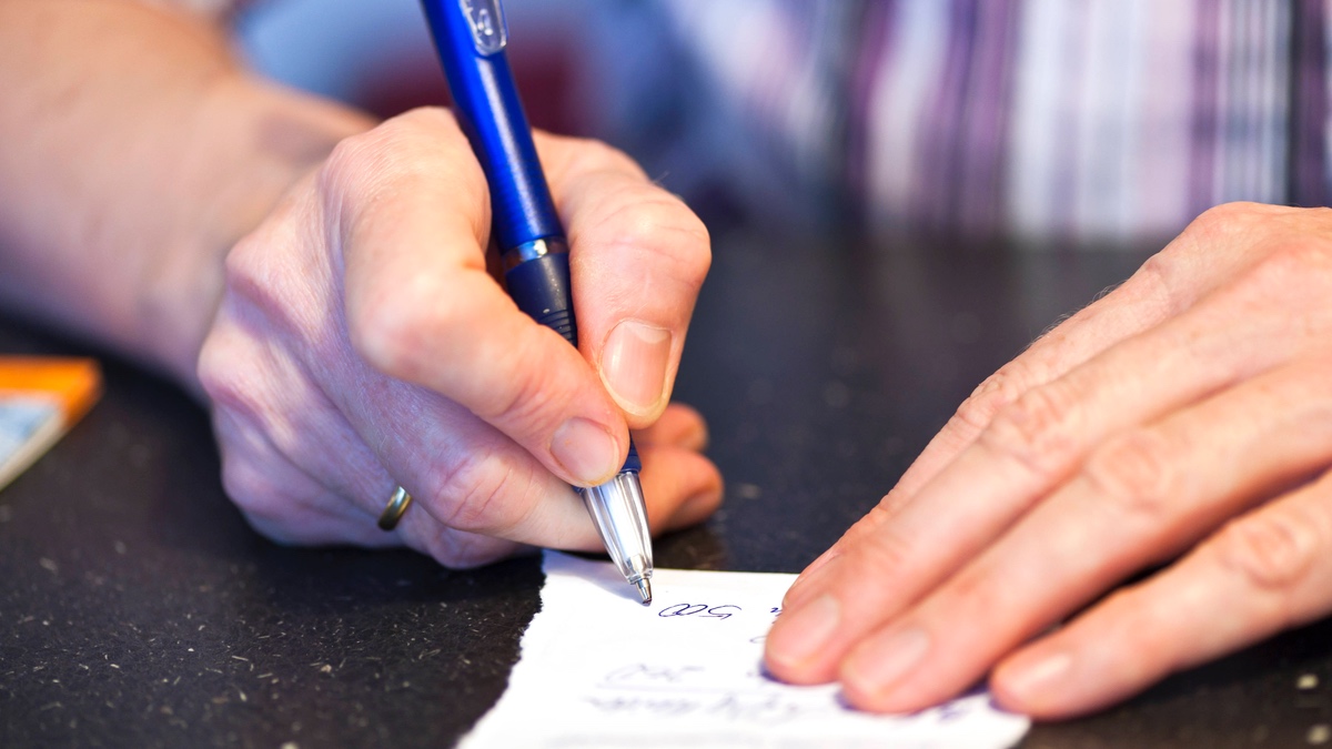 Handschriftliche Notiz.