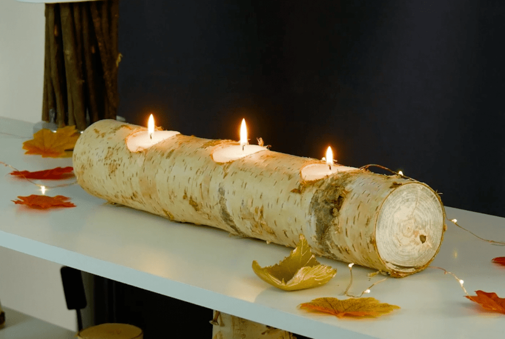 Ein Baumstamm als Kerzenständer