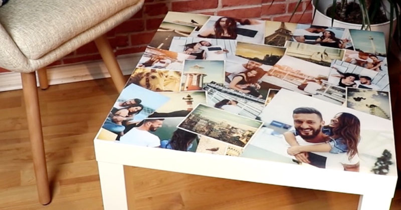 Ein weiÃŸer, kleiner IKEA-Tisch auf dem ausgedruckte Fotos ausgebreitet sind