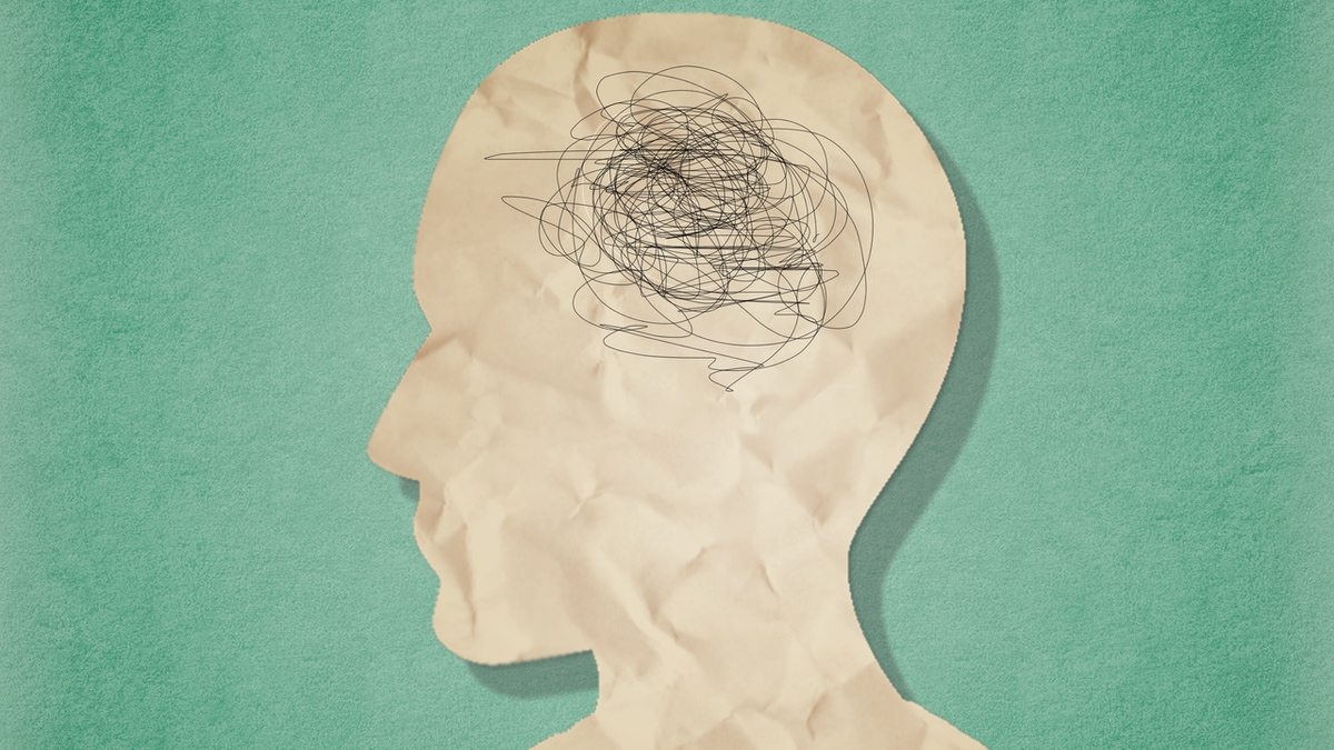 Eine Illustration eines Kopfes mit wirren Gedanken vor einem grünen Hintergrund.