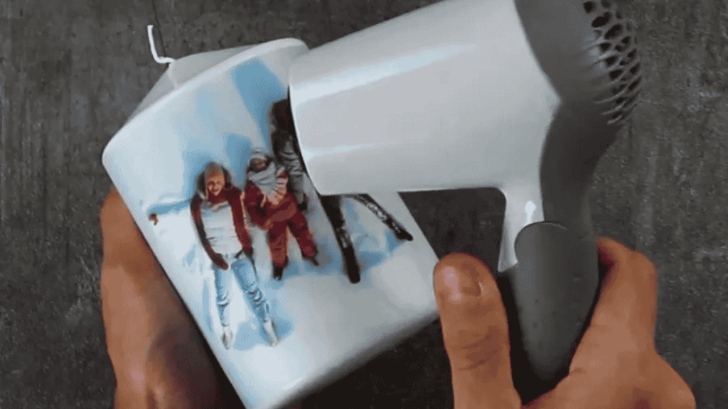 Fotokerze, Bild mit Föhn auftragen