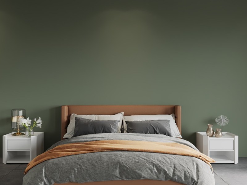 Ein minimalistisch eingerichtetes Schlafzimmer.